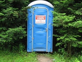 outhouse in forest