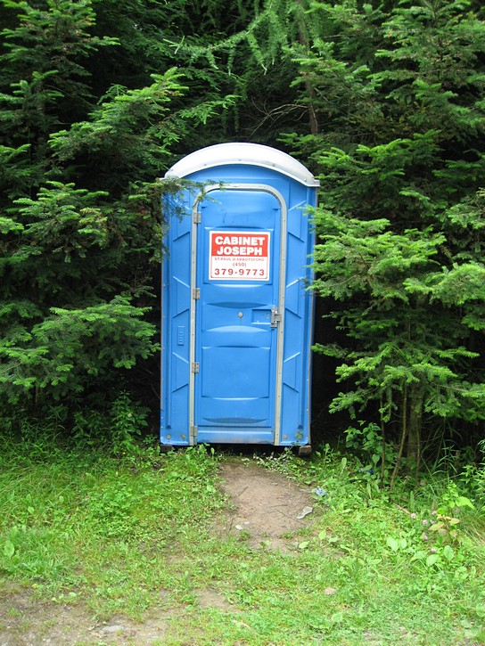 outhouse in forest