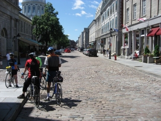 cyclists on Rue Saint Paul in Old Montreal.