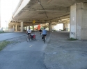 cycling on path under the Bonaventure Expressway