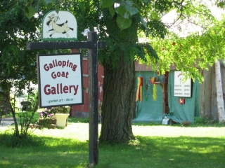 sign for Galloping Goat Gallery