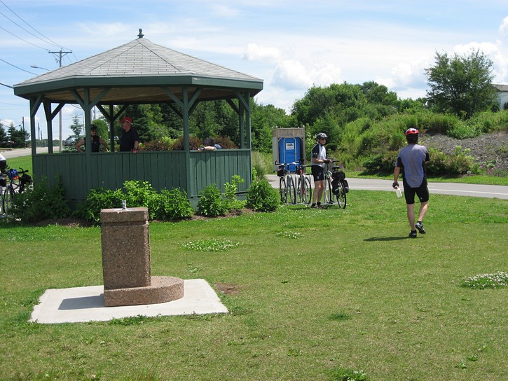 gazebo and water fountain next to bike path east of Levis
